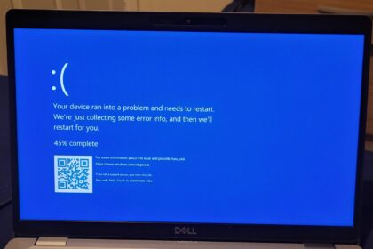 Windows Blue Screen of Death (BSOD) with QR code and error message