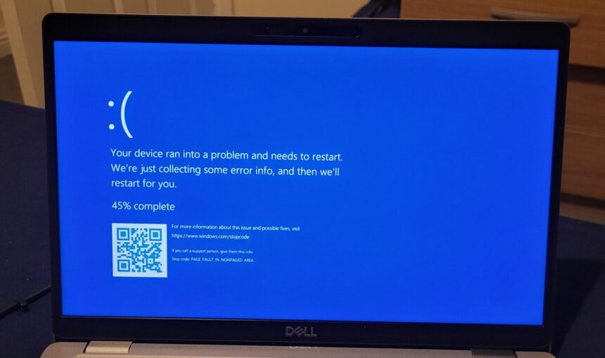 Windows Blue Screen of Death (BSOD) with QR code and error message
