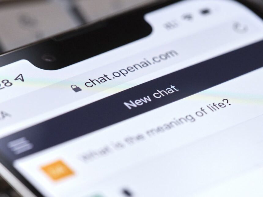 smartphone screen showing the ChatGPT interface on chat.openai.com, highlighting how users interact with AI