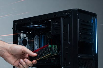 Installing a new RAM stick into a desktop PC to boost performance and speed